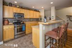 Kitchen with Stainless Steel Appliances- Bar Seating for 3